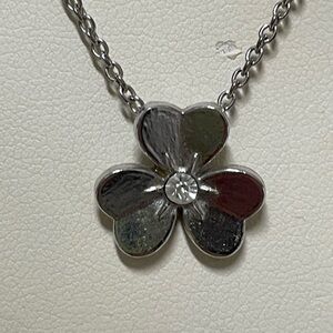 Silver tone three petal clover clear bright rhinestone center pendant necklace
